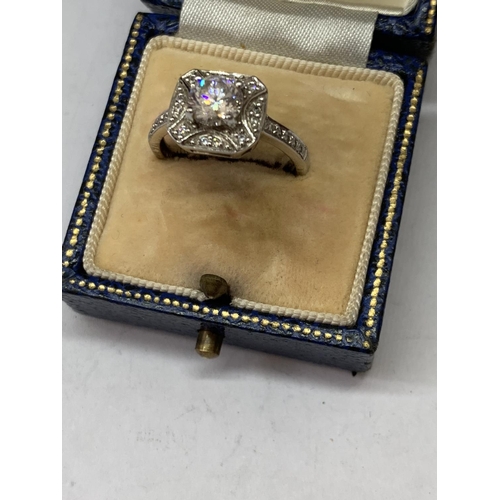 578 - A SILVER SOLITAIRE RING IN A PRESENTATION BOX