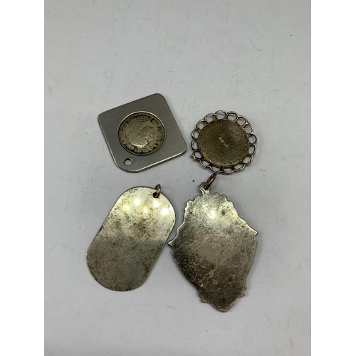 594 - FOUR SILVER FOBS