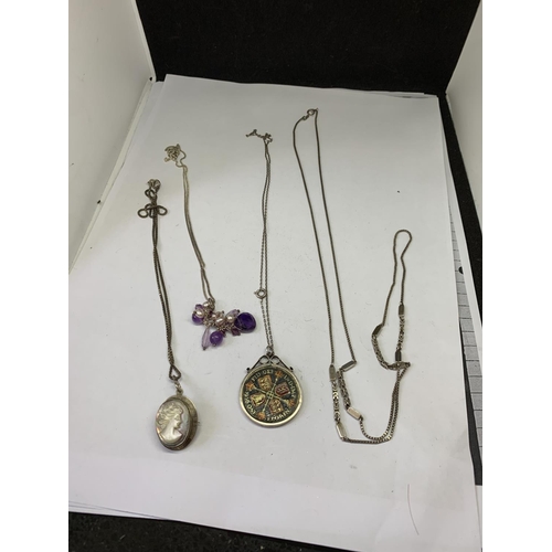 604 - FOUR SILVER NECKLACES