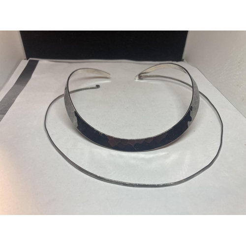 607 - TWO SILVER CHOKERS