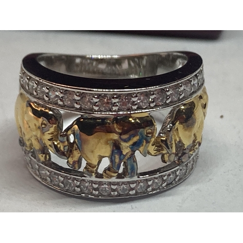 610 - A GOLD ON SILVER ELEPHANT RING IN A PRESENTATION BOX