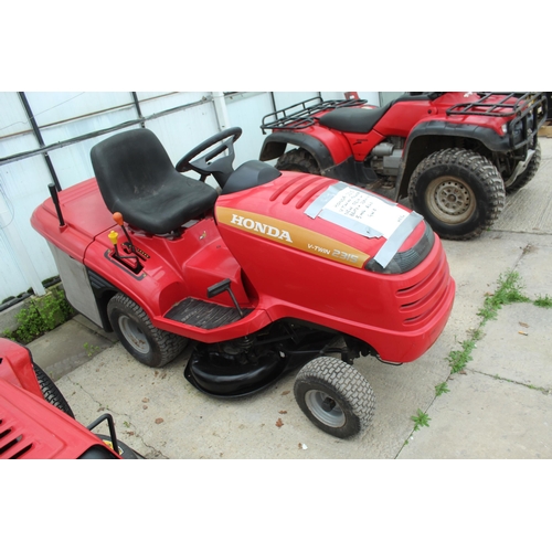 121 - HONDA RIDE ON MOWER 2315 IN GOOD WORKING ORDER  WITH NEW DECK AND BELTS  RECENTLY ADDED  NO  VAT