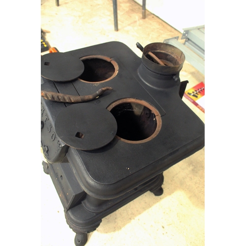 19 - FATSO CAST IRON COAL LOG BURNER IN GOOD WORKING ORDER  NO VAT