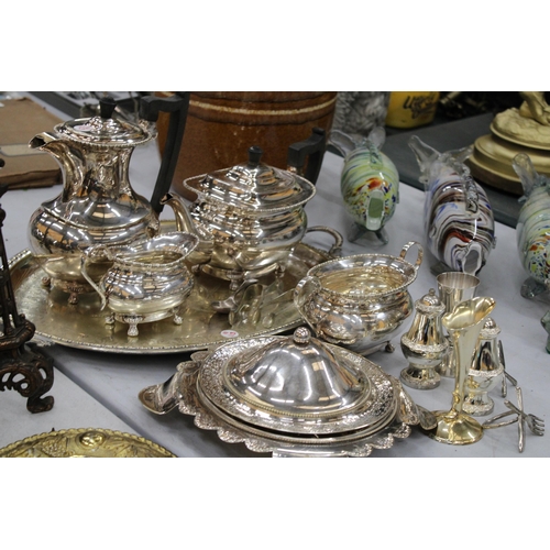 106 - A QUANTITY OF SILVER PLATED ITEMS TO INCLUDE A TRAY, TEAPOT, COFFEE POT, CREAM JUG, SUGAR BOWL, MUFF... 