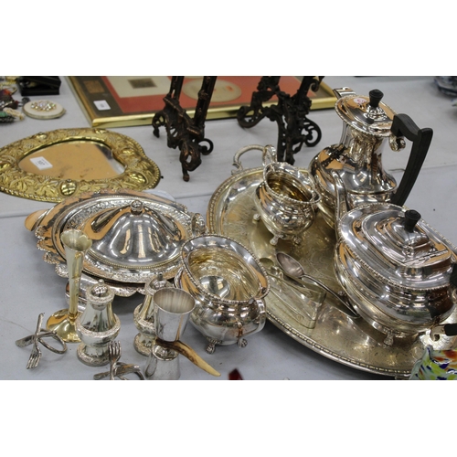 106 - A QUANTITY OF SILVER PLATED ITEMS TO INCLUDE A TRAY, TEAPOT, COFFEE POT, CREAM JUG, SUGAR BOWL, MUFF... 