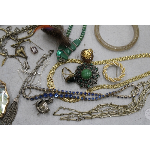 108 - A QUANTITY OF COSTUME JEWELLERY TO INCLUDE CHAINS AND PENDANTS, RINGS, MODERN POCKET WATCHES, BROOCH... 