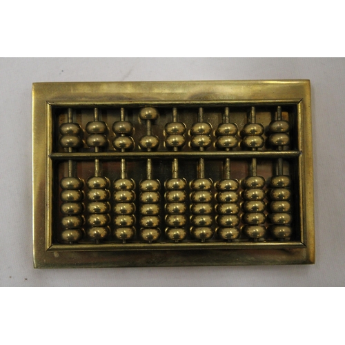 113 - A SMALL VINTAGE HEAVY BRASS ABACUS