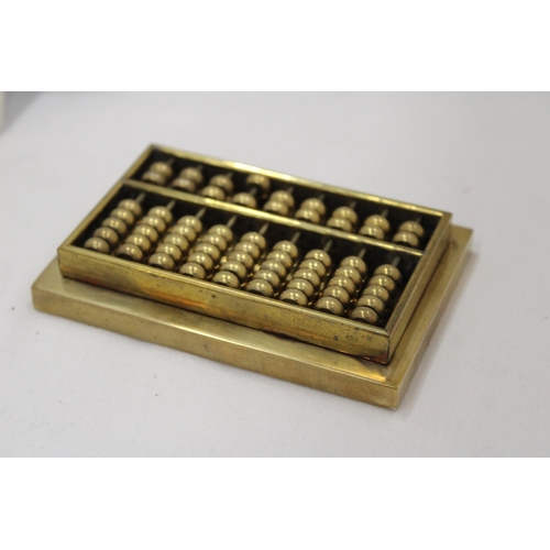 113 - A SMALL VINTAGE HEAVY BRASS ABACUS