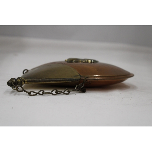 114 - A VINTAGE COPPER POWDER FLASK WITH A COAT OF ARMS