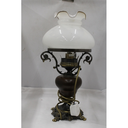 117 - A VINTAGE STYLE TABLE LAMP IN THE STYLE OF AN OIL LAMP, WITH FLUTED GLASS SHADE, WOODEN MIDDLE AND M... 