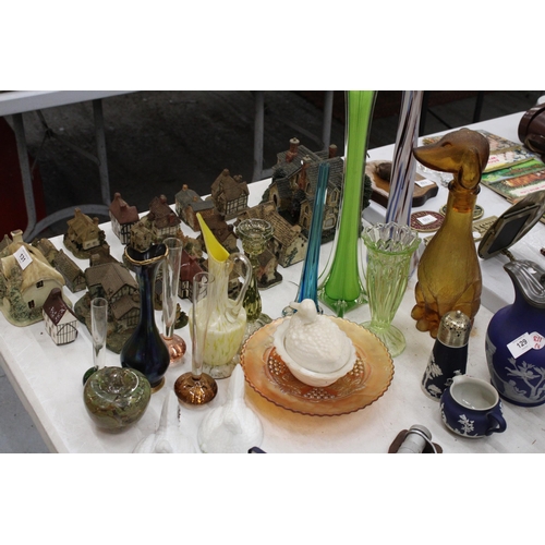 130 - A LARGE QUANTITY OF COLOURED GLASSWARE TO INCLUDE A DECANTER IN THE SHAPE OF A DOG, MURANO STYLE VAS... 