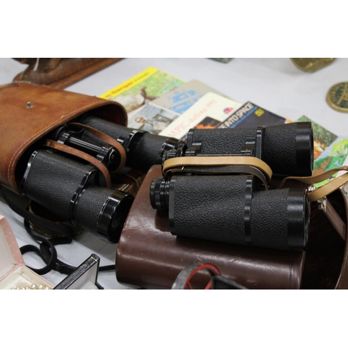 140 - TWO PAIRS OF BINOCULARS IN LEATHER CASES TO INCLUDE CARL ZEISS