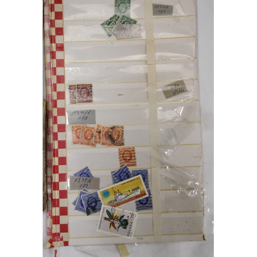 435 - A LARGE QUANTITY OF LOOSE STAMPS FROM AROUND THE WORLD