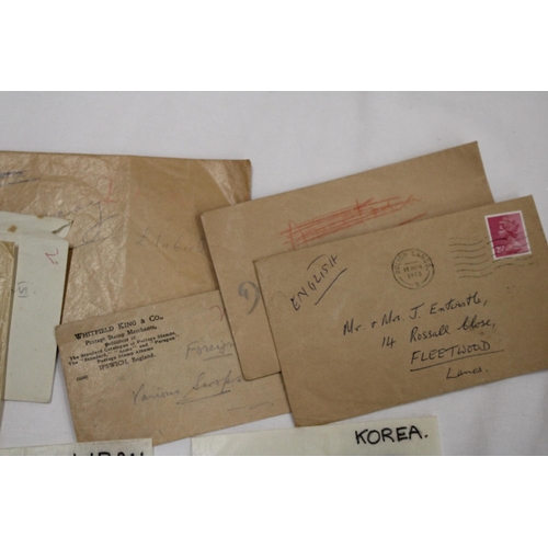 441 - A QUANTITY OF LOOSE STAMPS IN PACKETS FROM AROUND THE WORLD