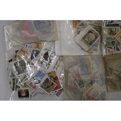 450 - A COLLECTION OF STAMPS IN PACKETS