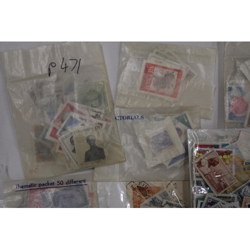 450 - A COLLECTION OF STAMPS IN PACKETS