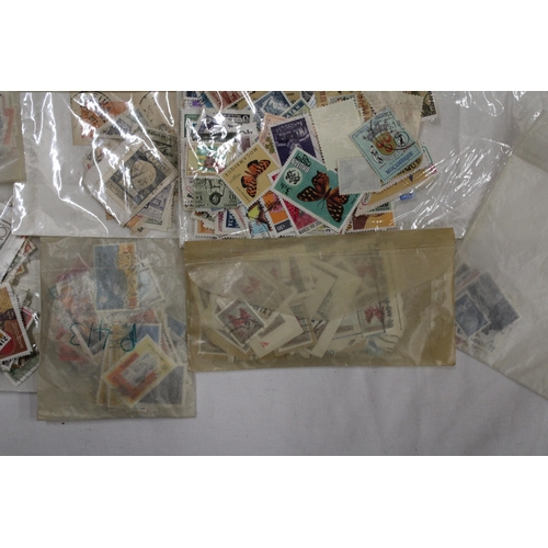 450 - A COLLECTION OF STAMPS IN PACKETS