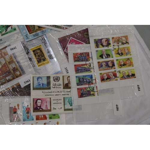 451 - A COLLECTION OF STAMPS ON MINIATURE SHEETS