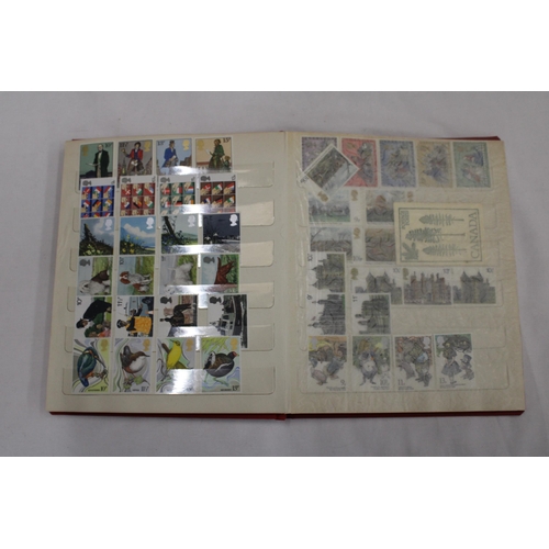 454 - A STAMP ALBUM CONTAINING A VARIETY OF STAMPS TO INCLUDE SHIPS, AIRCRAFT, CHRISTMAS, EUROPEAN COMMUNI... 