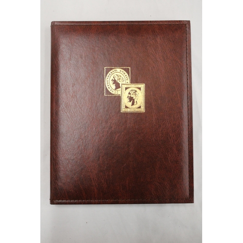 456 - A RED LEATHER BOUND STAMP ALBUM CONTAINING STAMPS  TO INCLUDE BIRDS, FLOWERS, ANIMALS, ETC.,