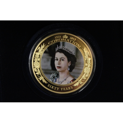 458 - A BOXED 2013 CORONATION JUBILEE 65MM COIN WITH CERTIFICATE OF AUTHENTICITY