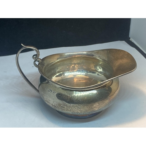 97 - A HALLMARKED BIRMINGHAM SILVER SAUCE BOAT