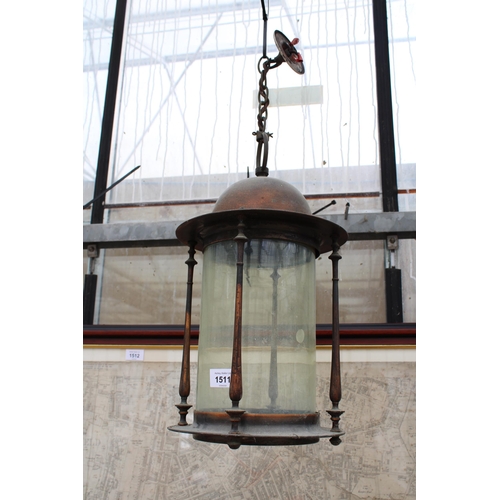 1511 - A DECORATIVE VINTAGE COPPER AND GLASS CEILING LIGHT FITTING