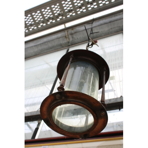 1511 - A DECORATIVE VINTAGE COPPER AND GLASS CEILING LIGHT FITTING