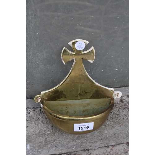 1516 - A VINTAGE BRASS WALL MOUNTED HOLY WATER CARRIER