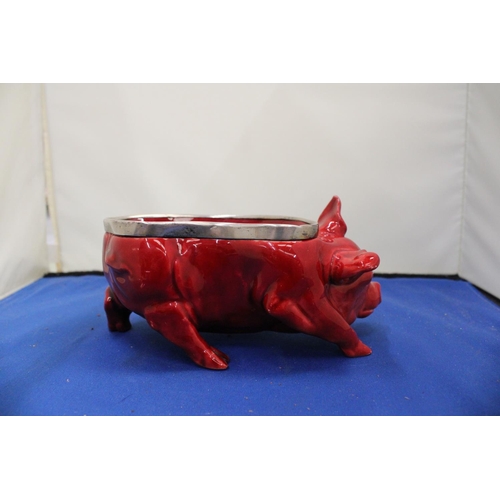 22 - A DOULTON FLAMBE PIG WITH A HALLMARKED BIRMINGHAM SILVER RIM