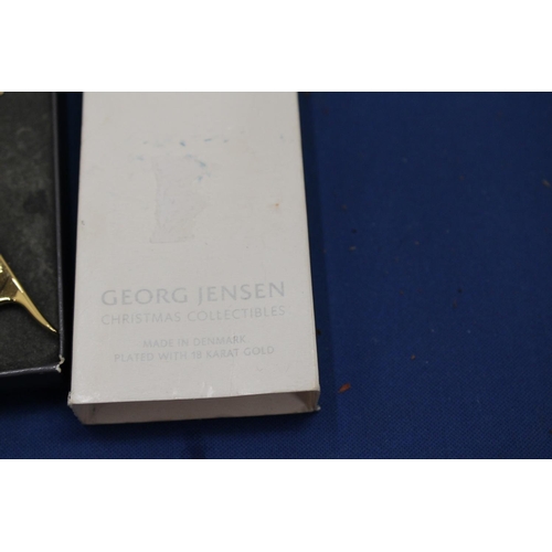 23 - A GEORG JENSON CHRISTMAS COLLECTION 18 KARAT GOLD PLATED ROBIN IN ORIGINAL BOX