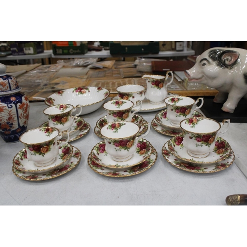 29 - TWENTY TWO PIECES OF ROYAL ALBERT OLD COUNTRY ROSES TO INCLUDE TRIOS, CAKE PLATE, SUGAR, MILK AND LA... 