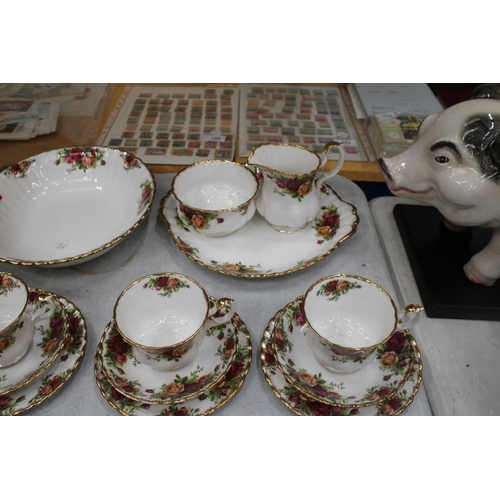 29 - TWENTY TWO PIECES OF ROYAL ALBERT OLD COUNTRY ROSES TO INCLUDE TRIOS, CAKE PLATE, SUGAR, MILK AND LA... 