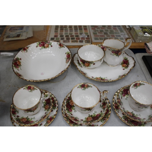 29 - TWENTY TWO PIECES OF ROYAL ALBERT OLD COUNTRY ROSES TO INCLUDE TRIOS, CAKE PLATE, SUGAR, MILK AND LA... 