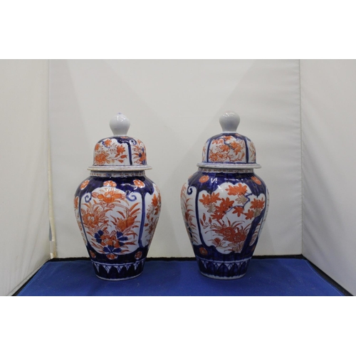 35 - A PAIR OF IMARI LIDDED GINGER JARS