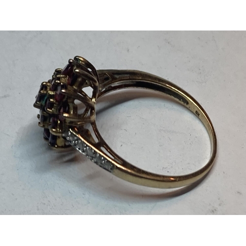 507 - A 9 CARAT GOLD CLUSTER RING WITH GARNETS AND DIAMONDS SIZE P