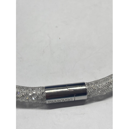 514 - A SWAROVSKI CRYSTAL SILVER COLOURED STARDUST BRACELET IN ORIGINAL PRESENTATION BOX WITH TAG