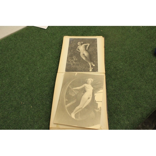 56 - A RARE ALBUM CONTAINING BLACK AND WHITE PHOTOGRAPHS TAKEN IN THE 1920'S/30'S OF WOMEN POSING NUDE. O... 