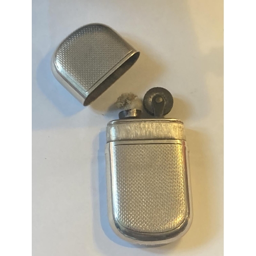 614 - A HALLMARKED BIRMINGHAM SILVER LIGHTER