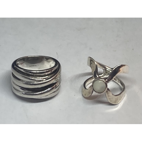 619 - TWO SILVER DRESS RINGS