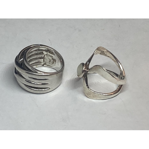 619 - TWO SILVER DRESS RINGS