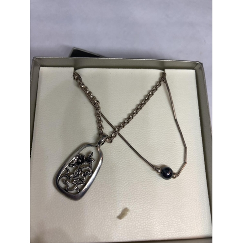 624 - TWO SILVER NECKLACES IN A BOX