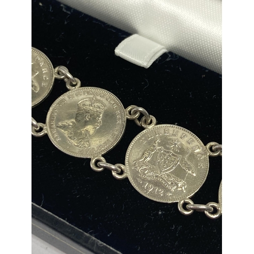 640 - A PRE WWI 925 SILVER AUSTRALIAN THREE PENCE COIN BRACELET IN A PRESENTATION BOX