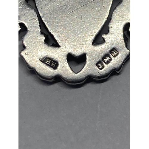 643 - A SILVER AND GOLD WATCH FOB