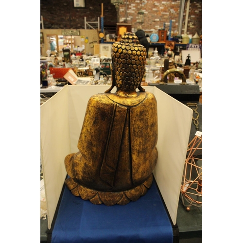 66 - A LARGE GILDED MEDIATING BUDDAH FIGURE 24