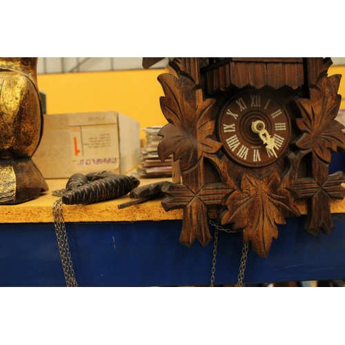 67 - A HAND CARVED BLACK FOREST STERNREITER CUCKOO CLOCK VENDOR STATES IN WORKING ORDER BUT NO WARRANTY G... 