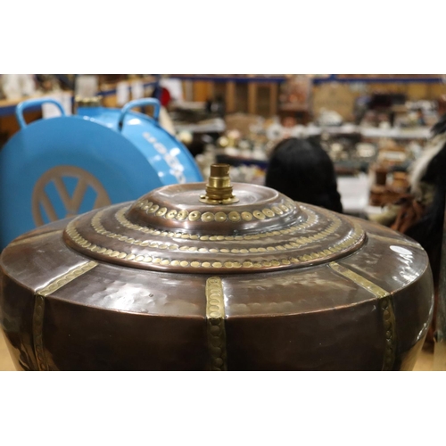 987 - A LARGE INDIAN STYLE BRASS AND COPPER LAMP BASE HEIGHT APPROX 36CM