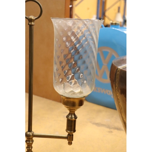 988 - A BRASS TWO-ARM STUDENT CANDLE LAMP WITH HURRICANE SHADES