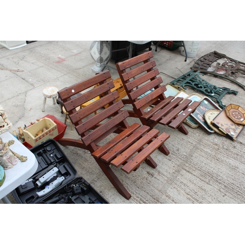 1676 - A PAIR OF FOLDING WOODEN GARDEN CHAIRS