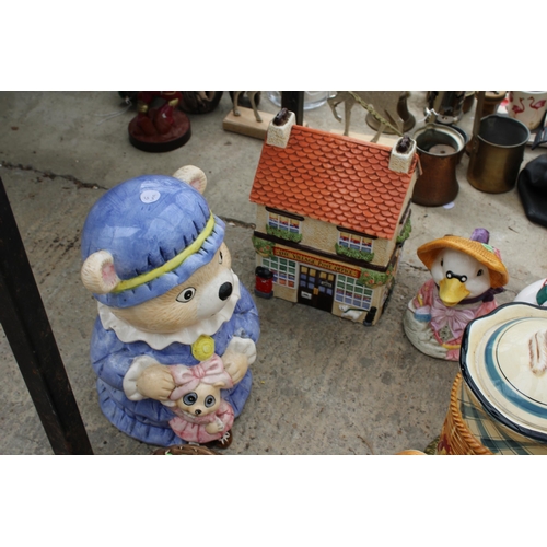 1683 - AN ASSORTMENT OF NOVELTY CERAMIC TEAPOTS AND BISCUIT BARRELS